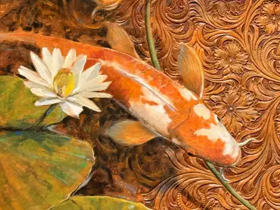 A koi fish swims beneath a lily pad.