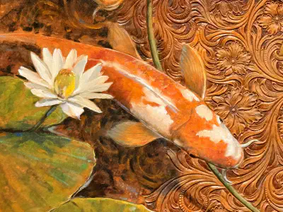 A koi fish swims beneath a lily pad.